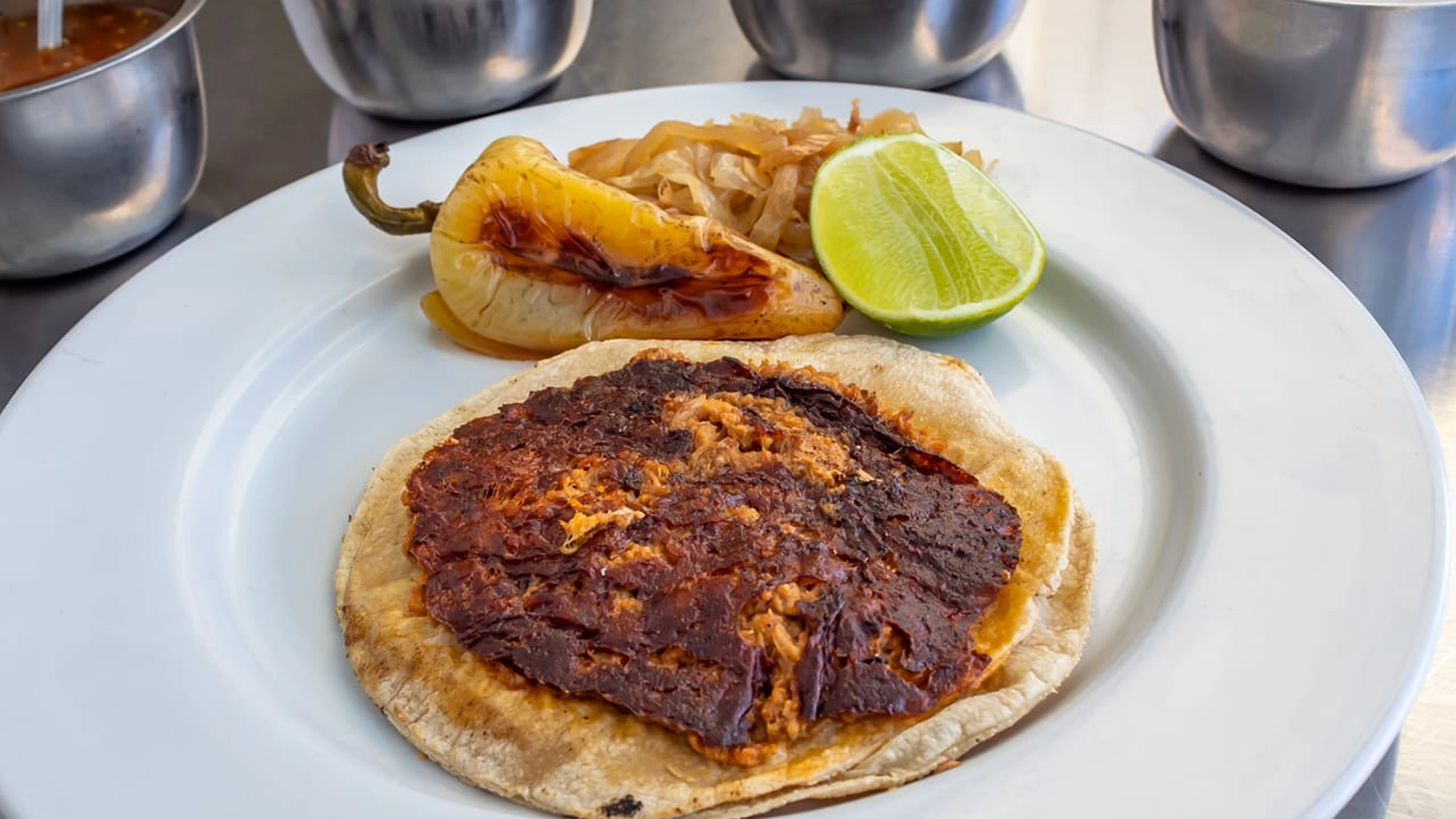 Taco de barbacoa planchado de Los Tocayos La Estancia